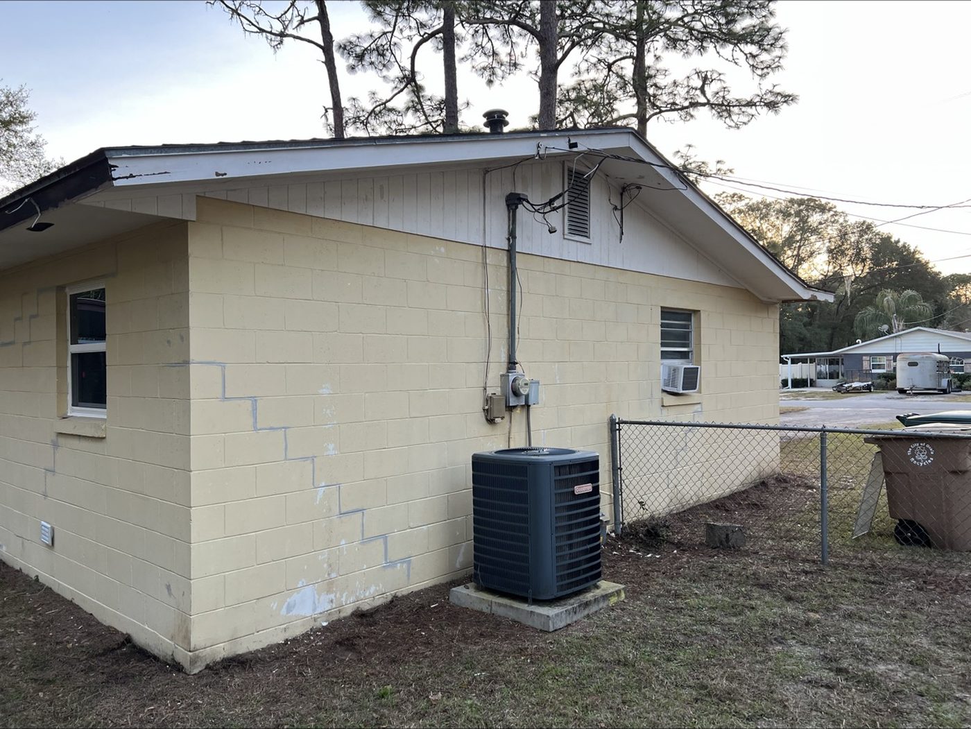 Before: same exterior corner in faded yellow