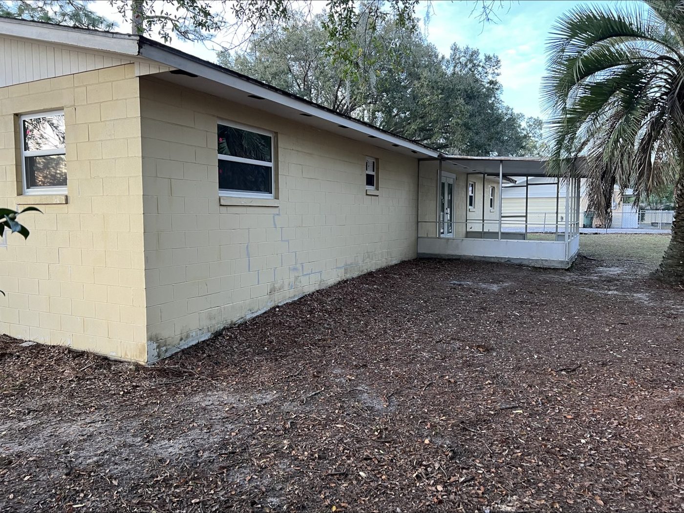Before: same side elevation in faded yellow