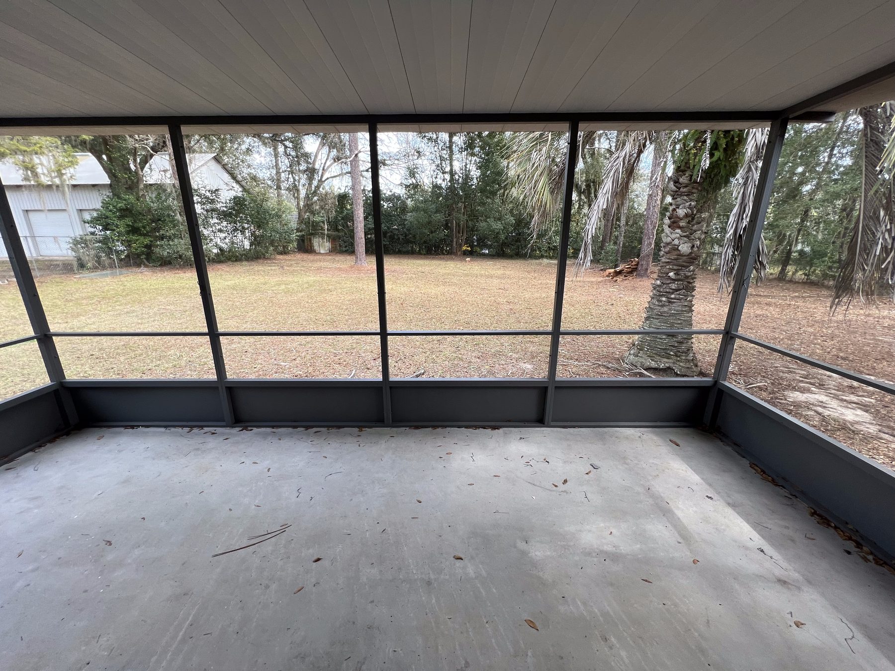 Freshly painted screened porch addition